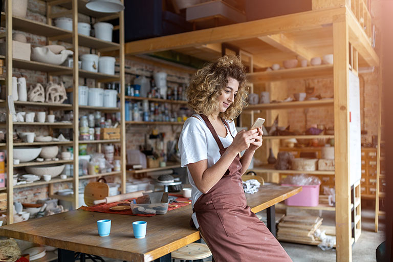 Businesswoman on smartphone.