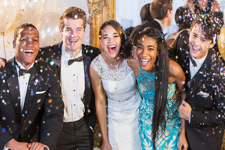 young men and women celebrating