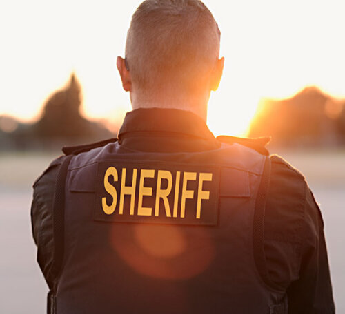 Sheriff Looking at Sunset