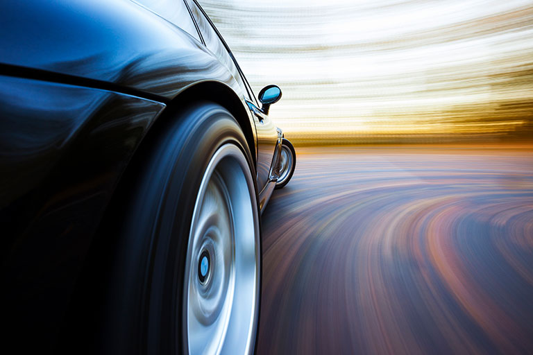 Speeding car on highway