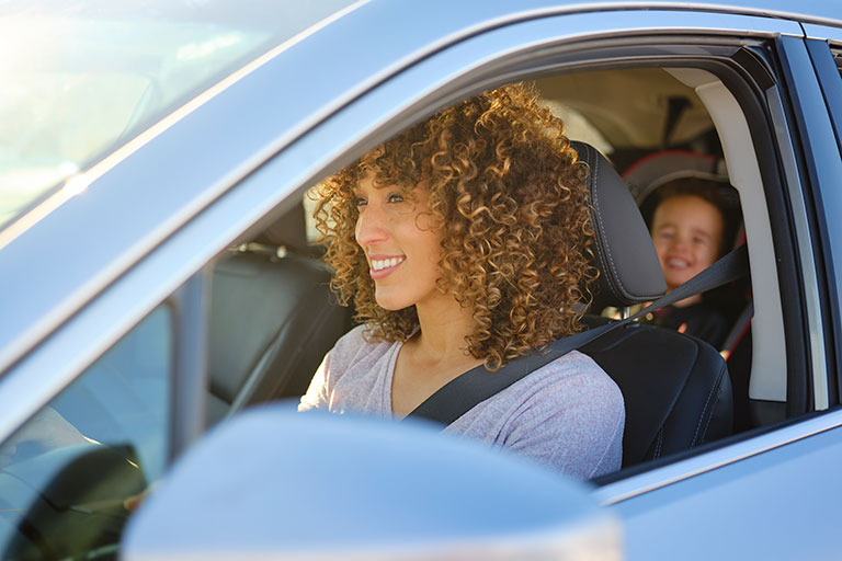 Woman and son in car
