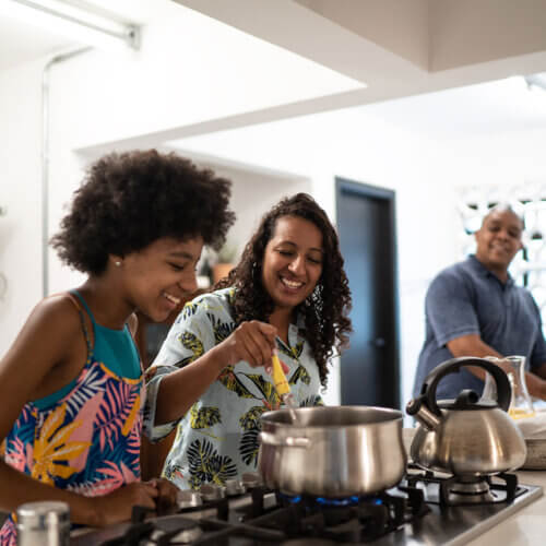 Family cooking in the kitchen together