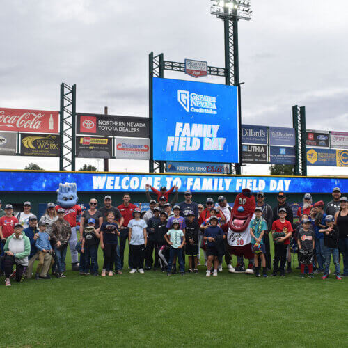 Group photo from the 2022 Family Field Day event at Greater Nevada Field