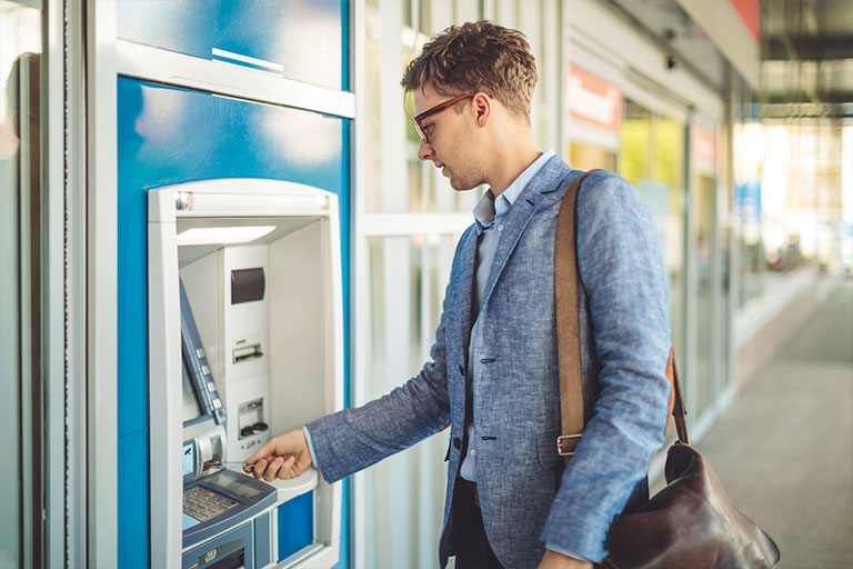 Man at ATM.