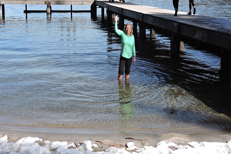 GNCU team member waves from waters of Lake Tahoe