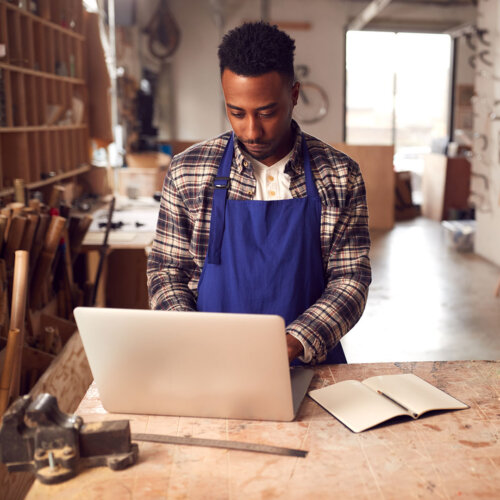 Small business owner on his laptop