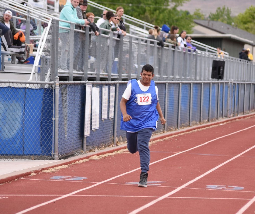 Special Olympics Nevada athlete running track