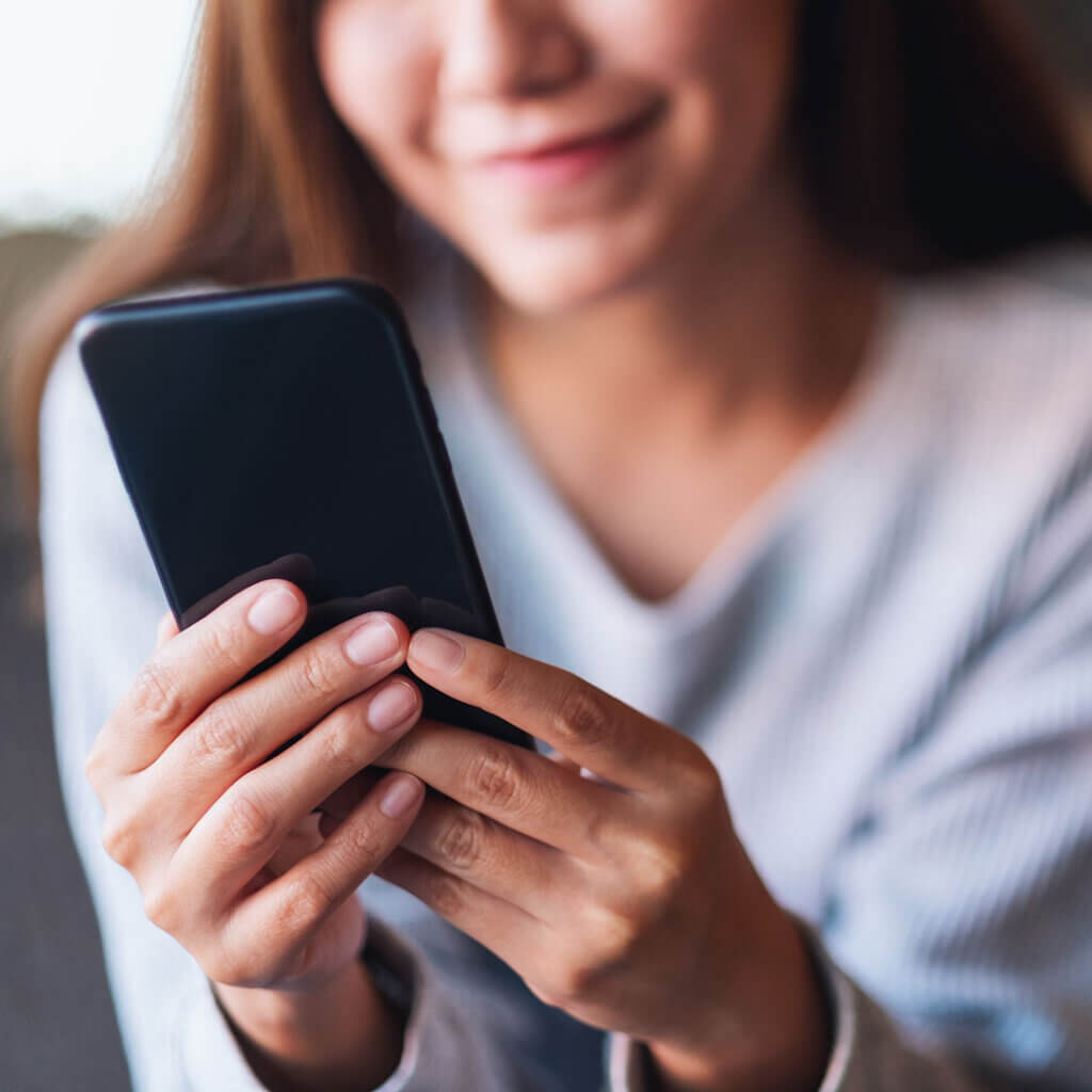 Woman using her smartphone