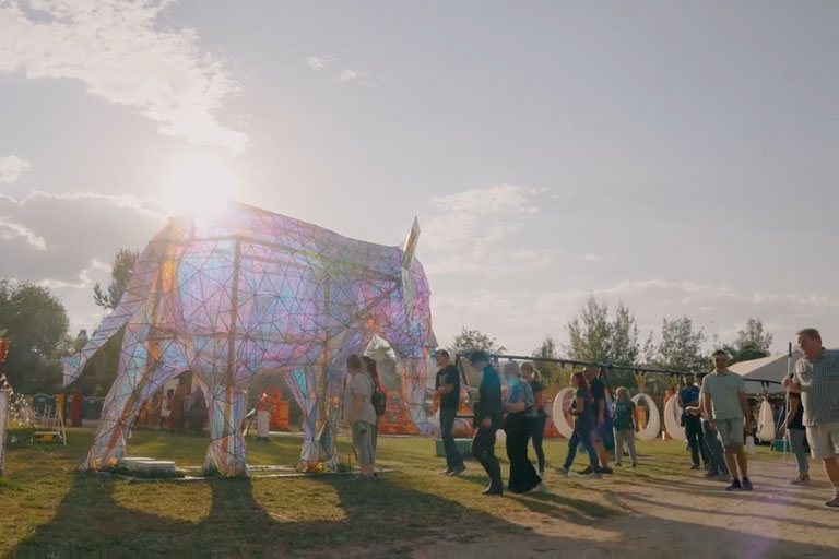 Tour to a group of blind participants at Dragon Lights Reno 