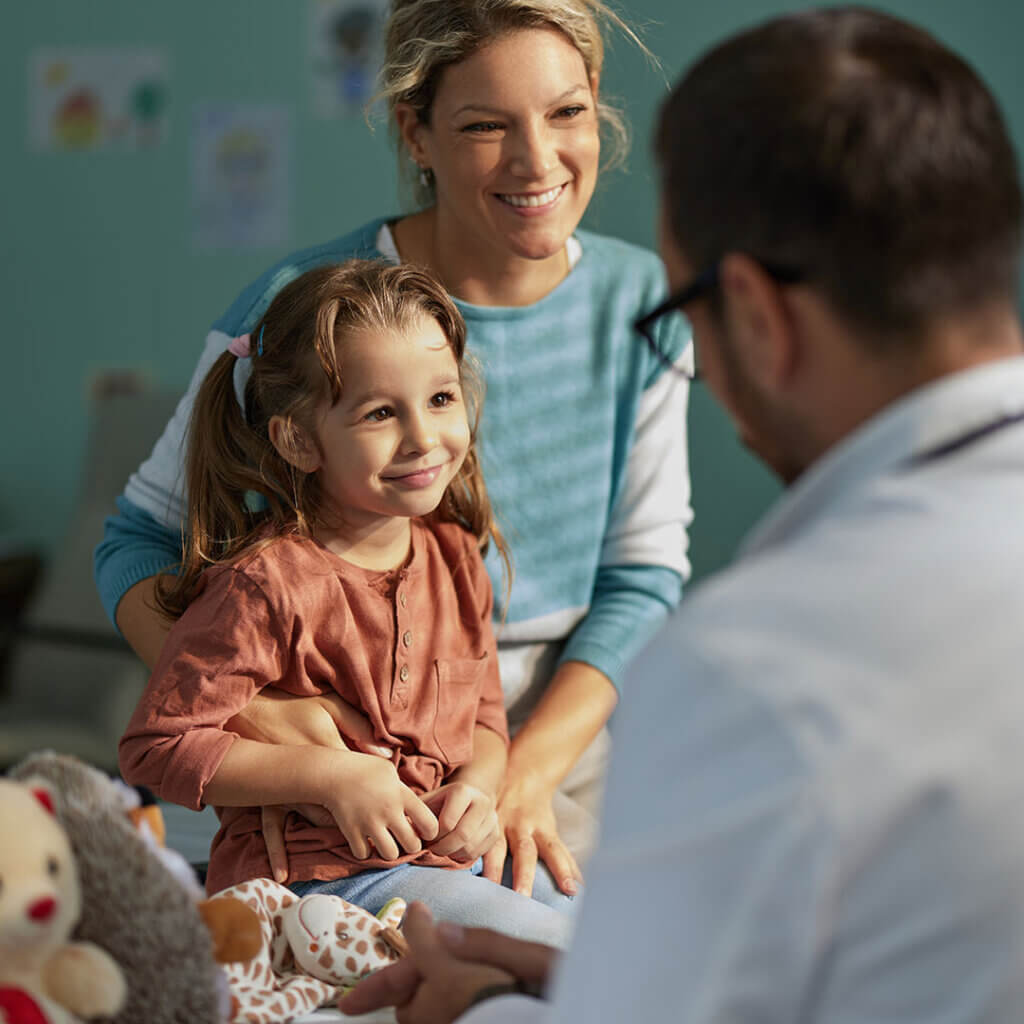 Mom and daughter at a doctor visit using their Hometown Health HSA