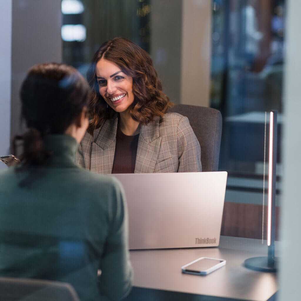 Financial services professional with a client