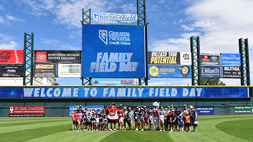 Group photo of the 2025 Family Field Day at Greater Nevada Field