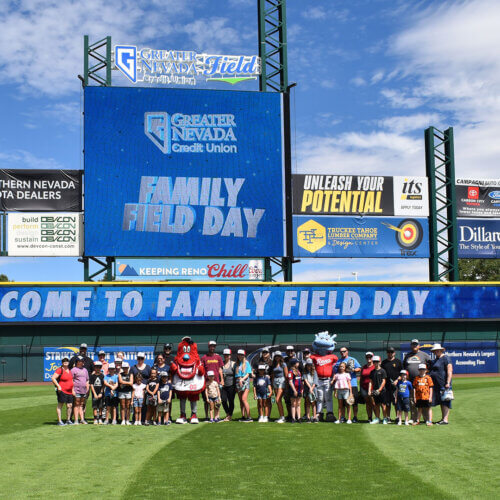 Group photo of the 2025 Family Field Day at Greater Nevada Field